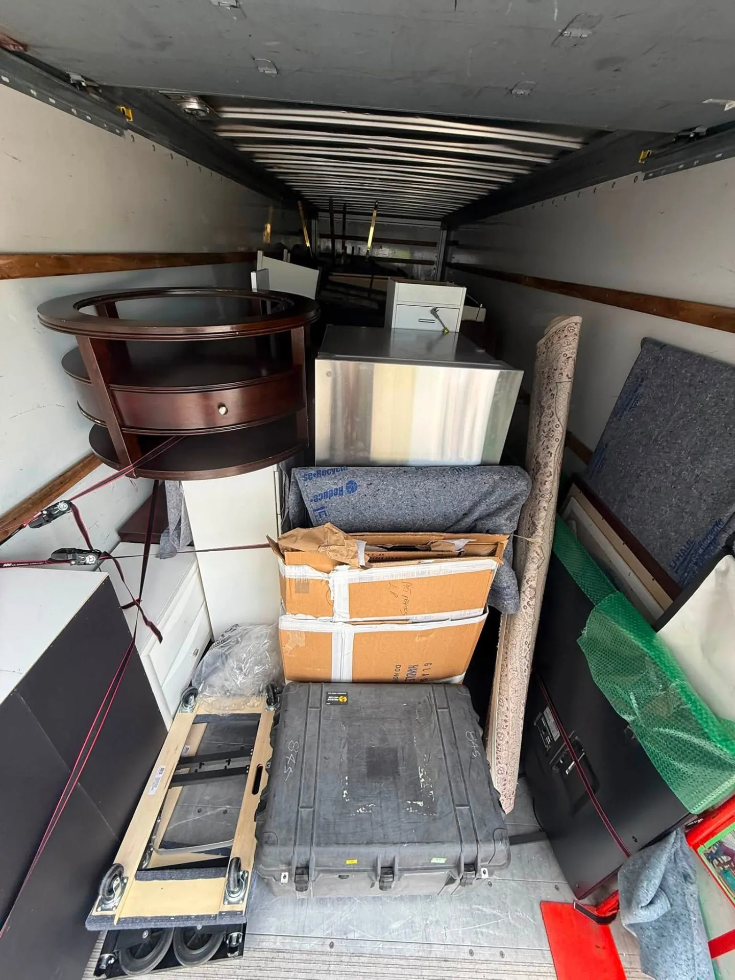 Full household load packed tight inside the moving truck
